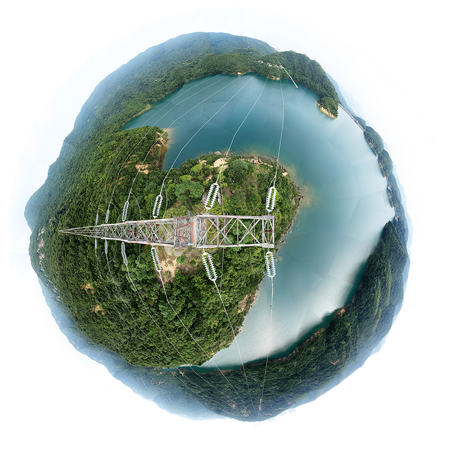 Tai Tam Reservoir lake - Hong Kong Island - 360 degree landscape photographed from the summit of a transmission tower. The circular image represents the self in a holisitic cosmos. The perspective is a result of a view obtained after climbing electricity tower. The collage of photographs forms a circle.